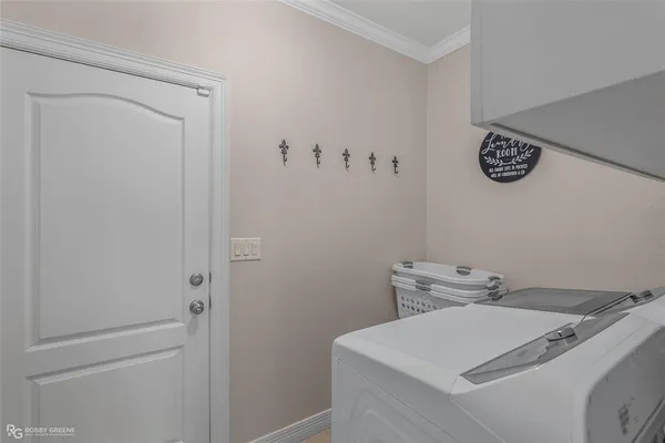 a view of a house with backyard porch and sitting area