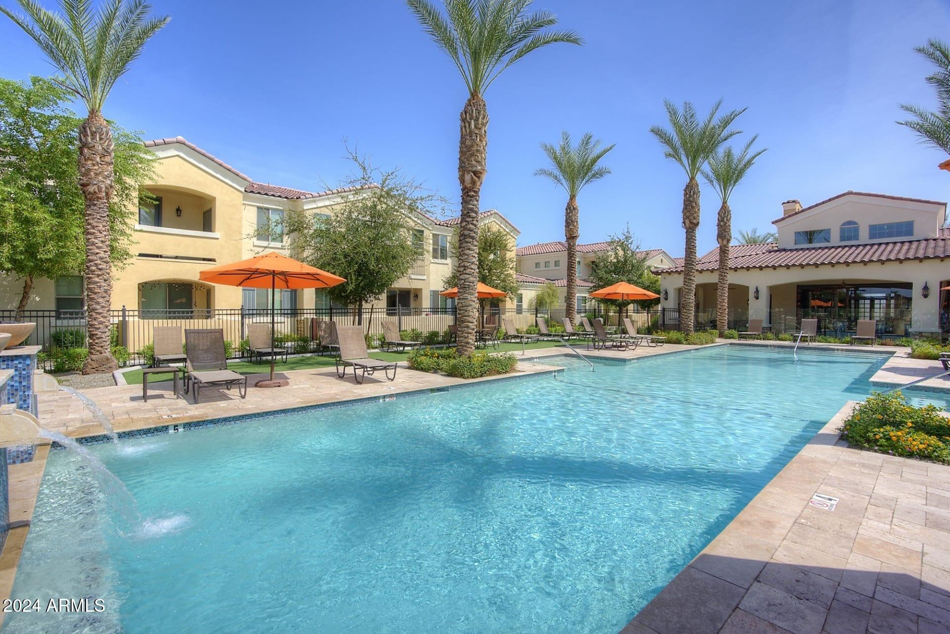 1350 South Ellsworth Road, Unit 2 Mesa, AZ 85209 - Photo 13 of 44 a view of multiple houses with swimming pool