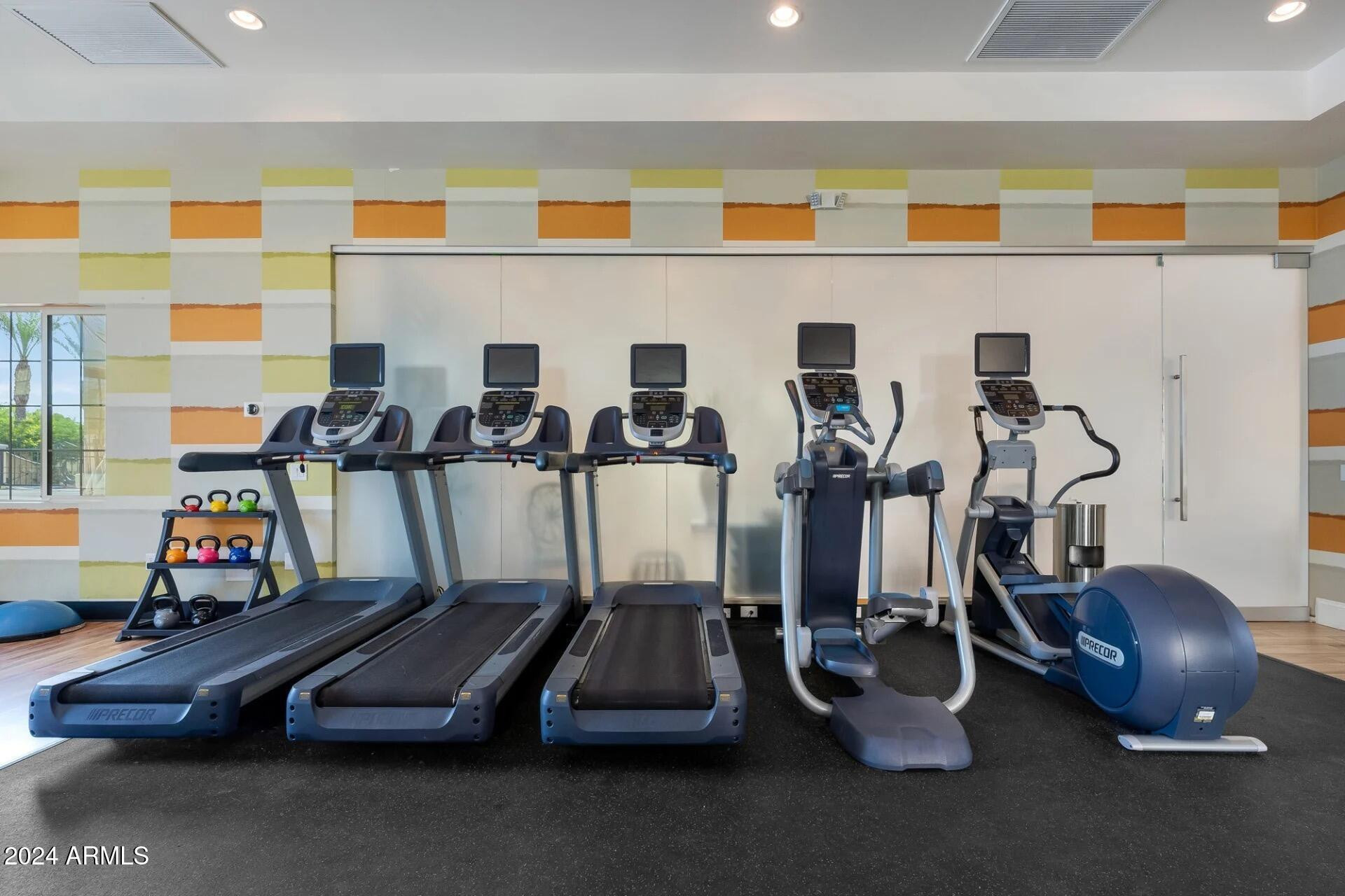 1350 South Ellsworth Road, Unit 2 Mesa, AZ 85209 - Photo 29 of 44 a room with gym equipment
