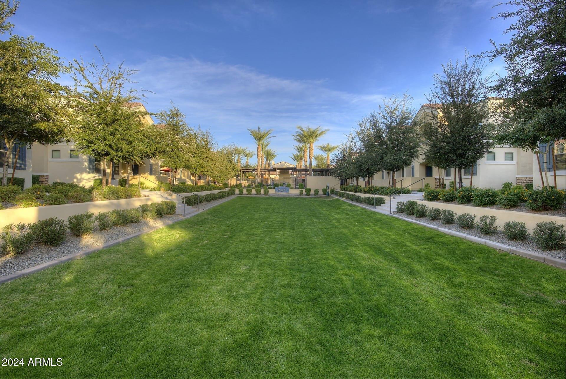 1350 South Ellsworth Road, Unit 2 Mesa, AZ 85209 - Photo 36 of 44 a view of a park with large trees