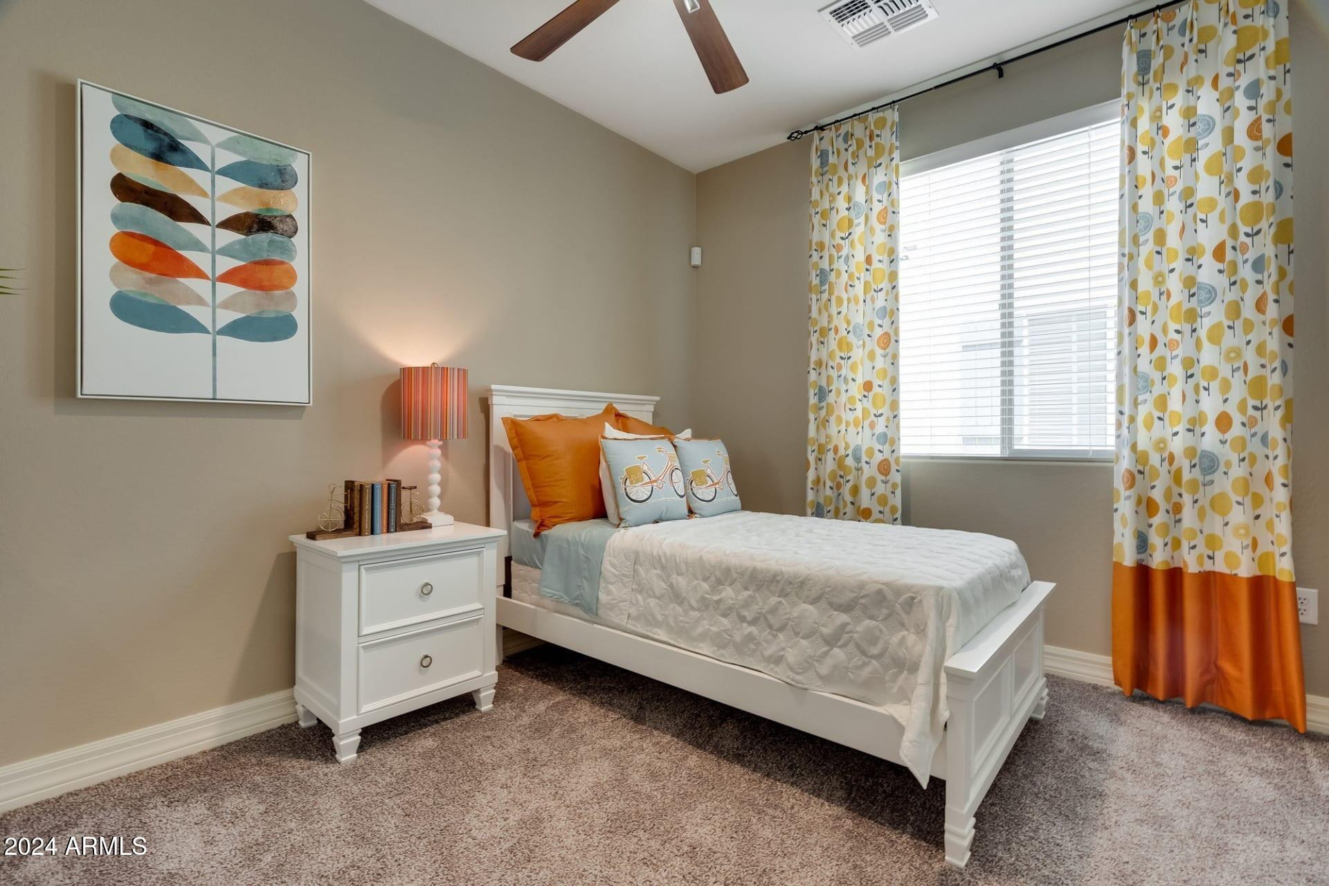 1350 South Ellsworth Road, Unit 2 Mesa, AZ 85209 - Photo 6 of 44 a bedroom with a bed and window