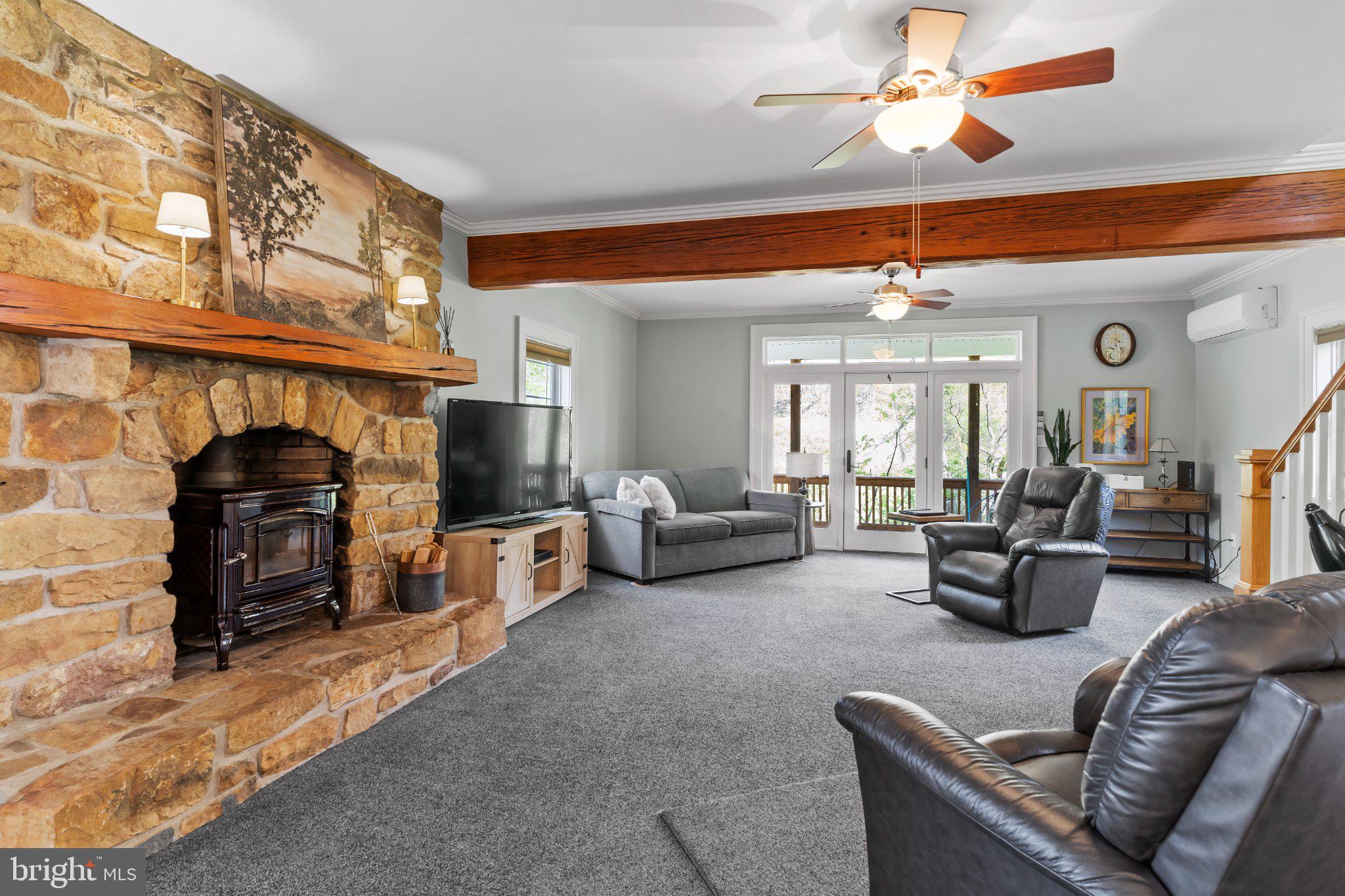 502 Creek Road Carlisle, PA 17013 - Photo 18 of 43 Cozy living space with rustic charm.
