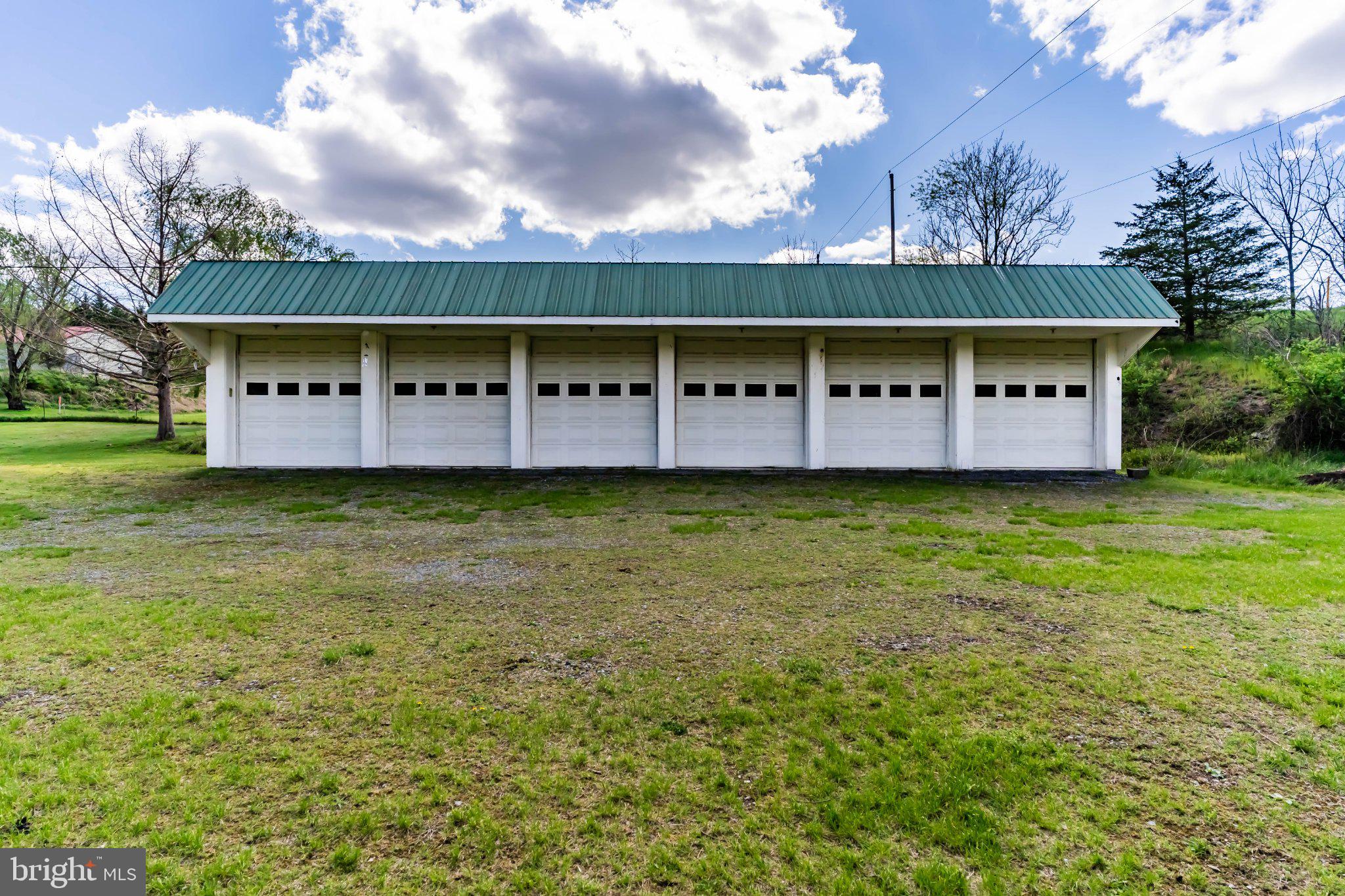 502 Creek Road Carlisle, PA 17013 - Photo 41 of 43 Spacious garage with green roof charm.