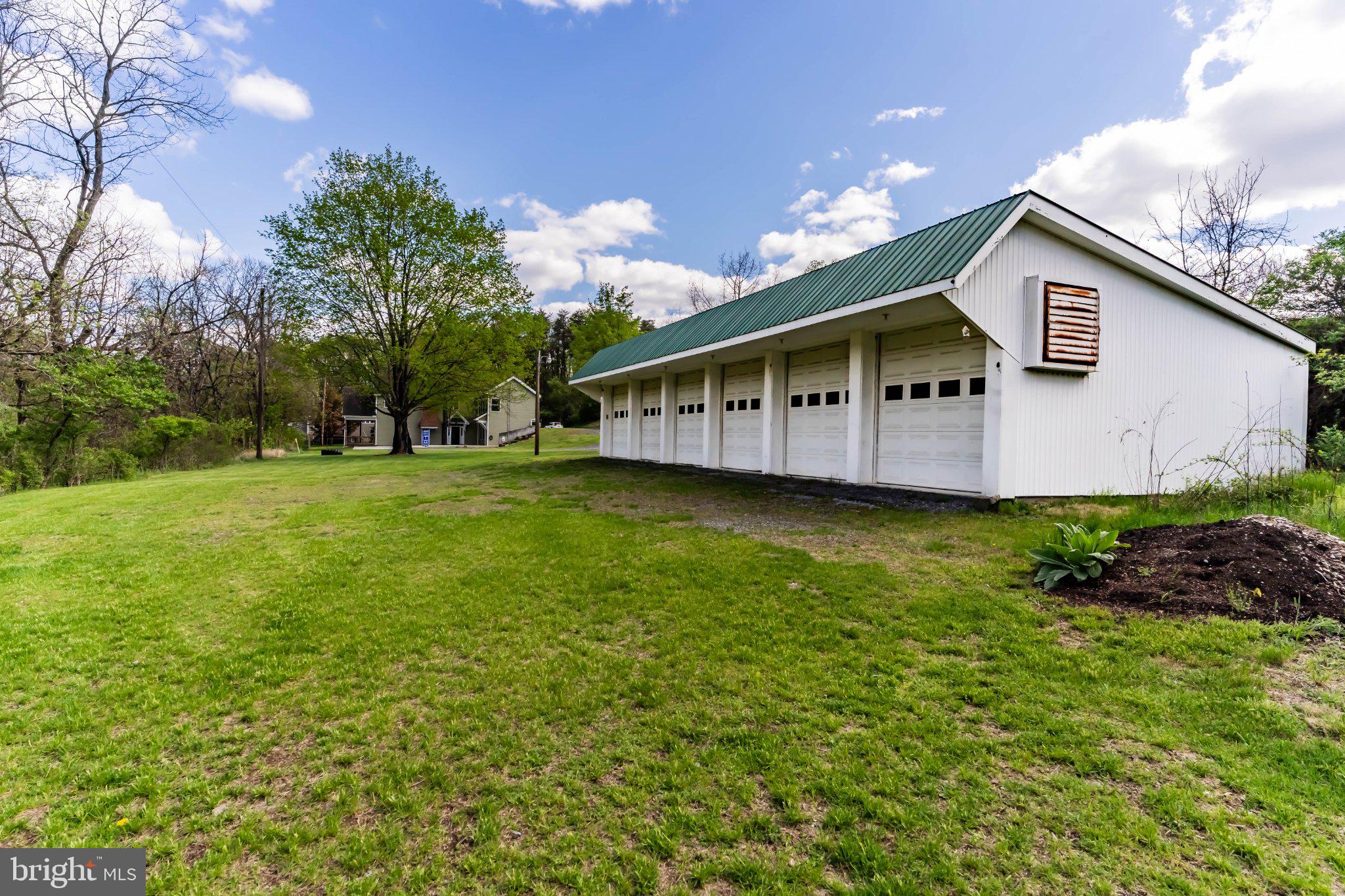 502 Creek Road Carlisle, PA 17013 - Photo 42 of 43 Charming garage with scenic backdrop.