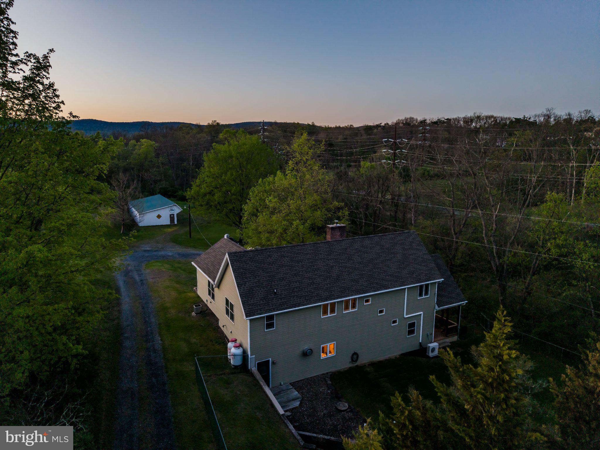 502 Creek Road Carlisle, PA 17013 - Photo 6 of 43 Serene home nestled in lush greenery.