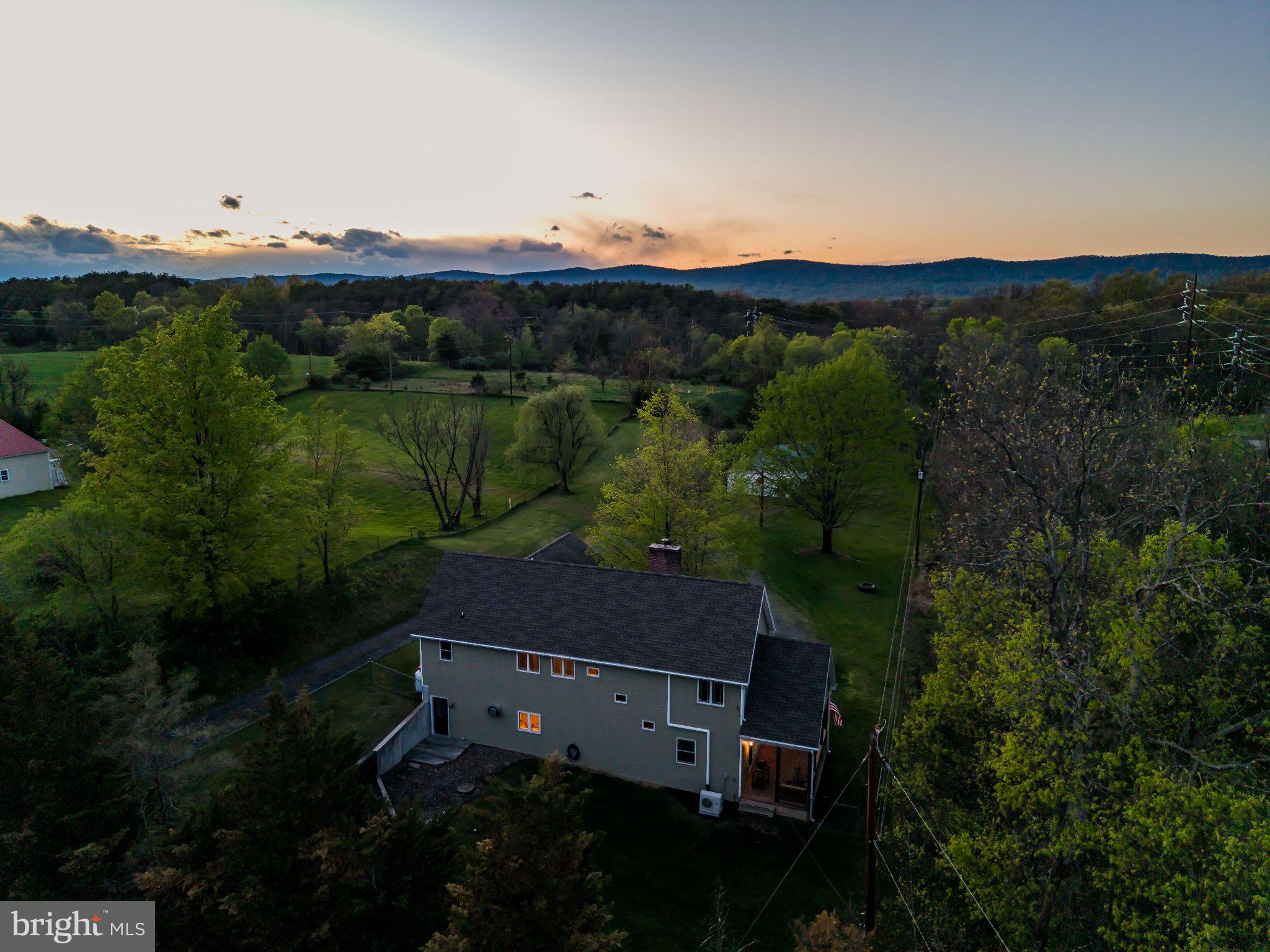 502 Creek Road Carlisle, PA 17013 - Photo 7 of 43 Serene sunset over a charming home.