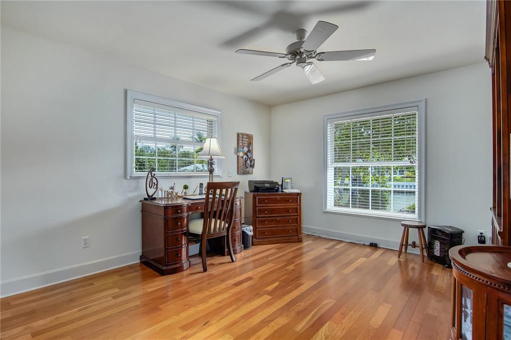 1626 Indian Bay Drive Vero Beach, FL 32963 - Photo 25 of 35 a view of a workspace with furniture and a window