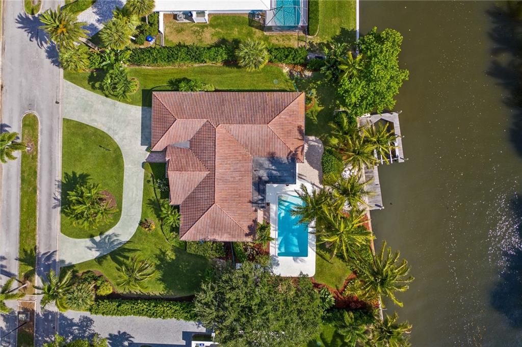 1626 Indian Bay Drive Vero Beach, FL 32963 - Photo 30 of 35 an aerial view of a house with a yard