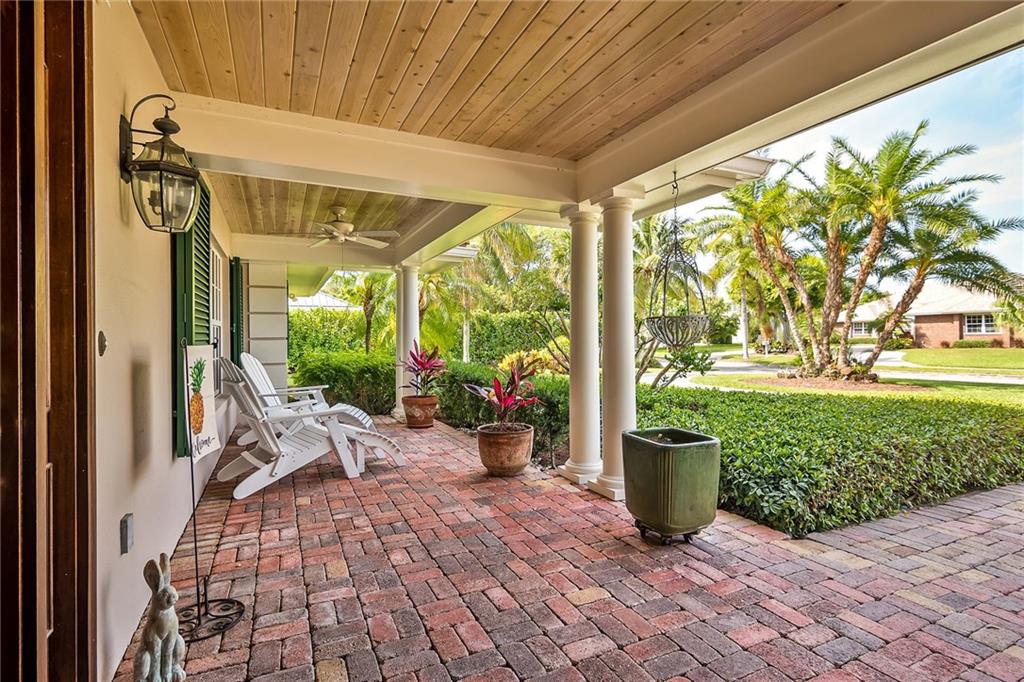 1626 Indian Bay Drive Vero Beach, FL 32963 - Photo 5 of 35 a view of a porch with wooden floor