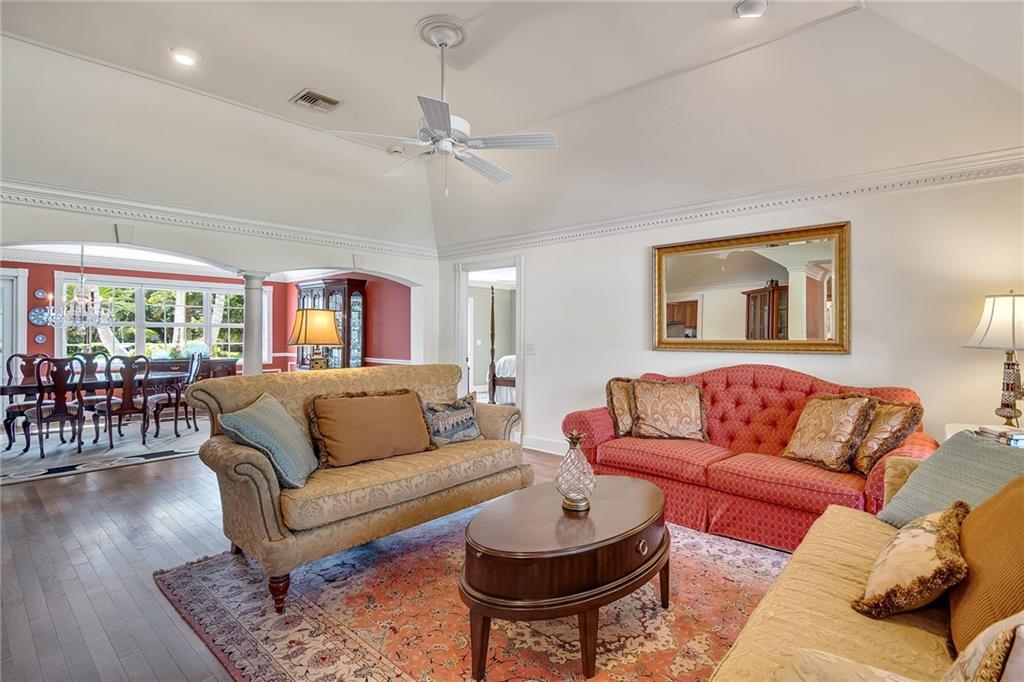 1626 Indian Bay Drive Vero Beach, FL 32963 - Photo 9 of 35 a living room with furniture and a large window