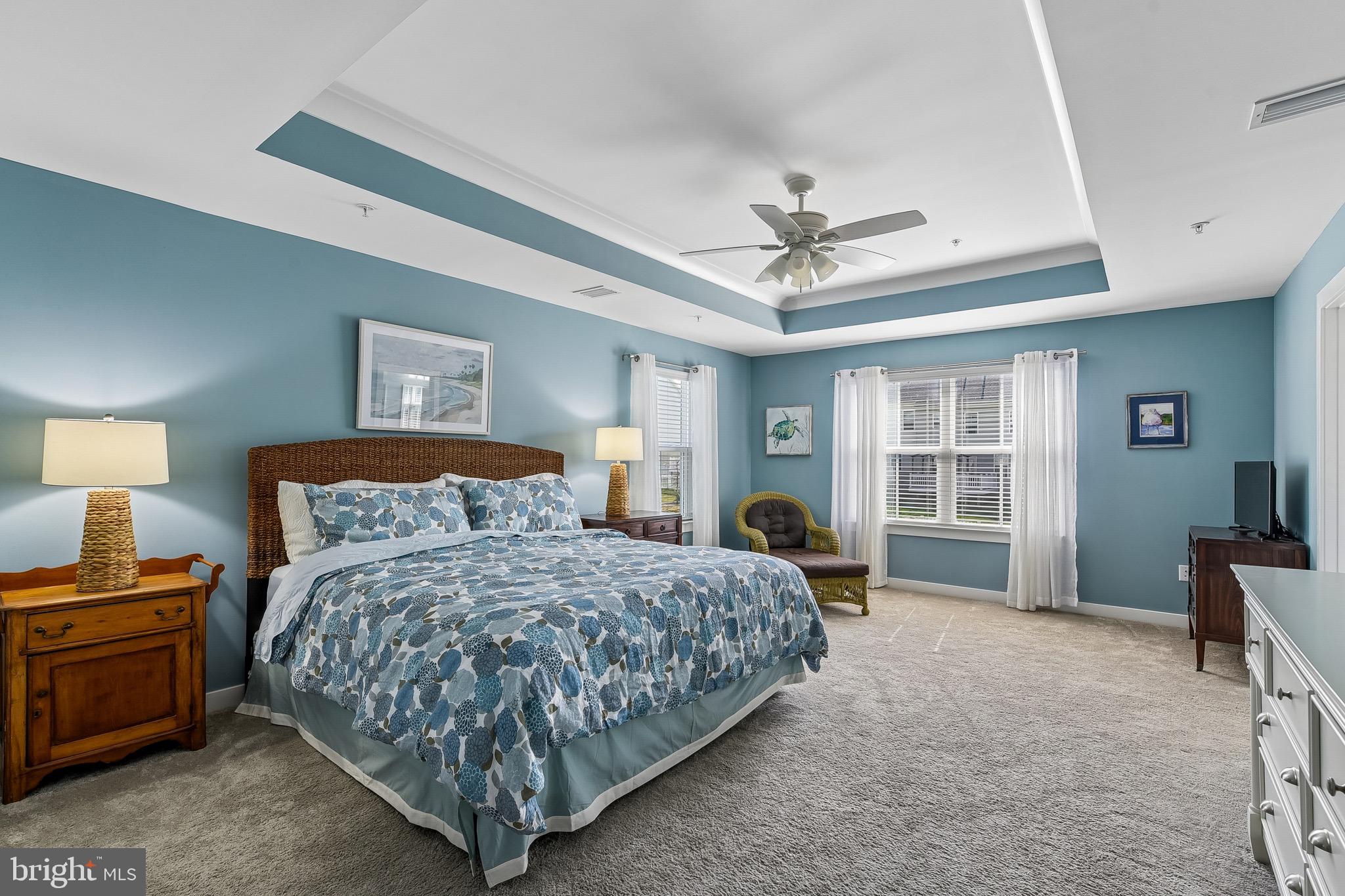 637 Iron Gate Road Bel Air, MD 21014 - Photo 16 of 35 a bedroom with a bed a ceiling fan and a dresser