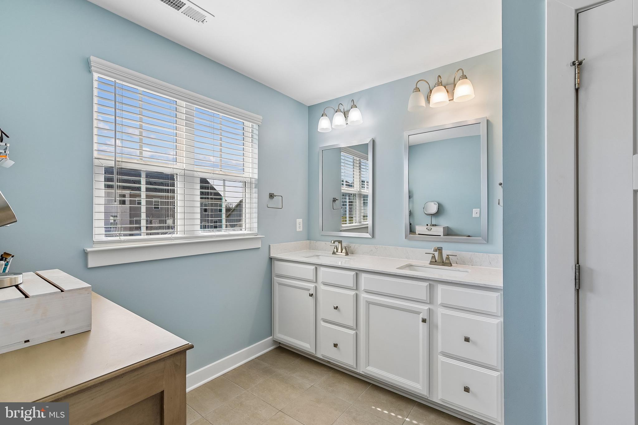 637 Iron Gate Road Bel Air, MD 21014 - Photo 20 of 35 a en suite bathroom with a granite countertop sink mirror and window