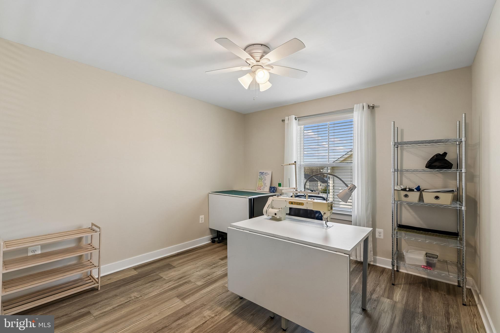 637 Iron Gate Road Bel Air, MD 21014 - Photo 24 of 35 a view of a workspace with wooden floor and white walls