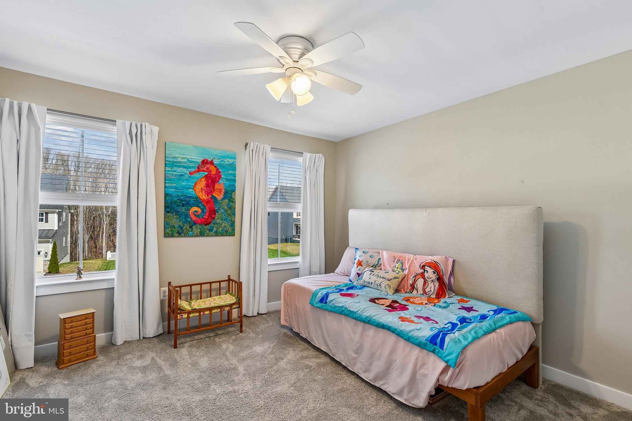 637 Iron Gate Road Bel Air, MD 21014 - Photo 26 of 35 a bedroom with a bed and a chandelier
