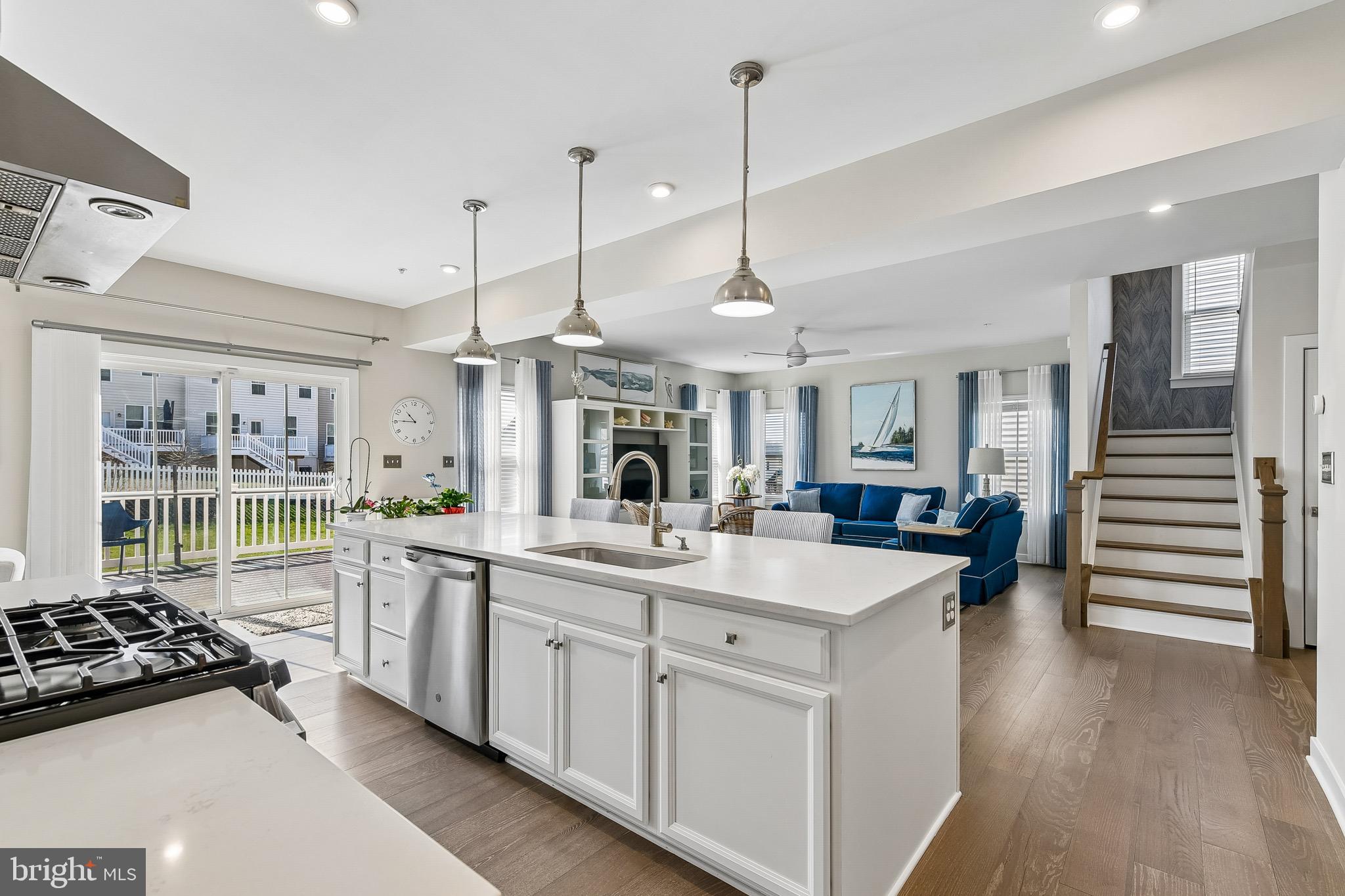 637 Iron Gate Road Bel Air, MD 21014 - Photo 35 of 35 a kitchen with stainless steel appliances granite countertop a sink a stove and a wooden floors