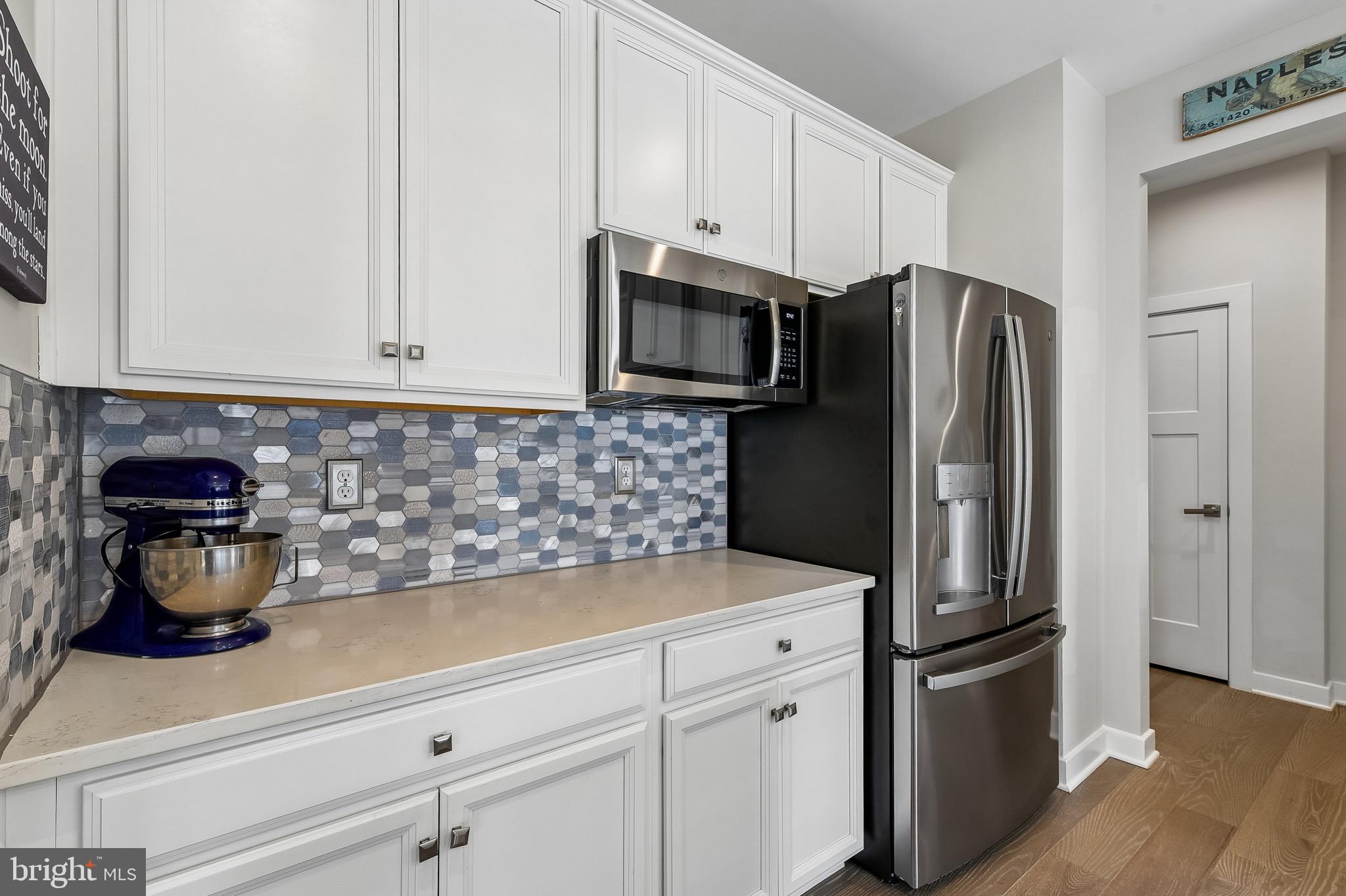 637 Iron Gate Road Bel Air, MD 21014 - Photo 7 of 35 a kitchen with stainless steel appliances granite countertop a refrigerator and a stove