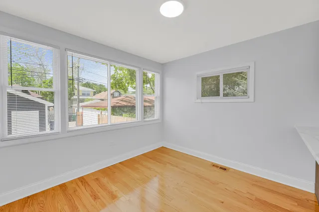 a view of a room with a large window