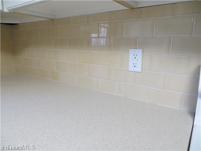 1859 Underpass Road Advance, NC 27006 - Photo 15 of 16 Other. Back splash and counter top in the kitchen.