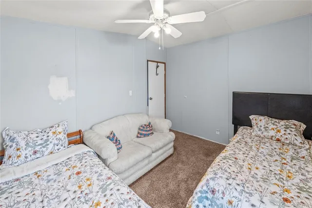 a view of a workspace with furniture