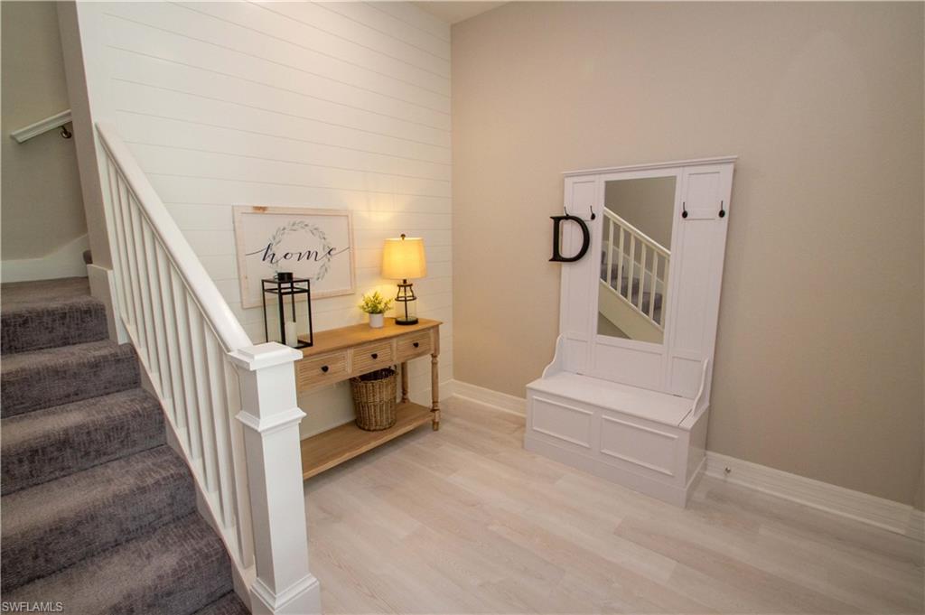 251 Indies Drive East, Unit 202 Naples, FL 34114 - Photo 3 of 48 a view of entryway and hall