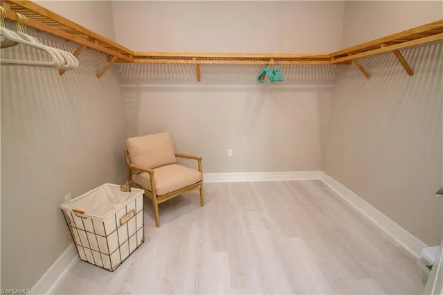 a spacious bathroom with a double vanity sink mirror and shower