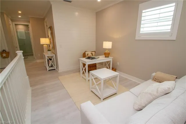 a large kitchen with a table and chairs