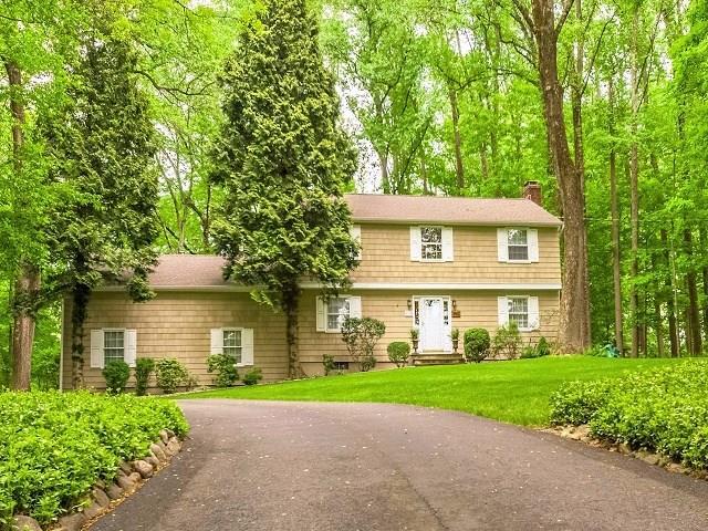 52 Old Washington Road Ridgefield, CT 06877 - Photo 1 of 1 a front view of house with yard and green space