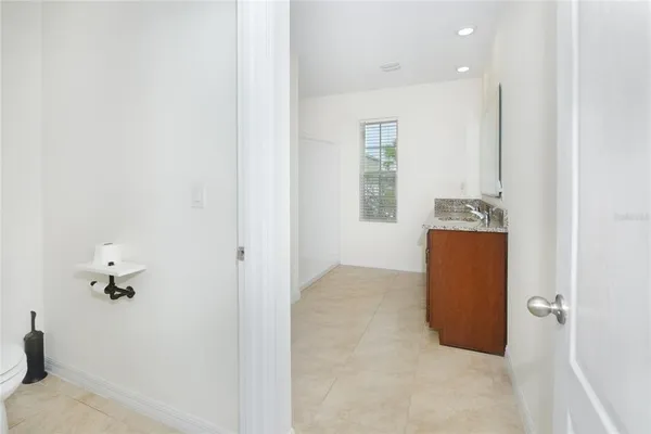 an entryway and room with a window