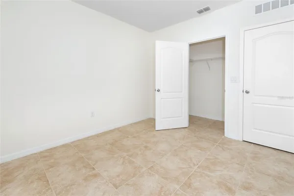 an empty room with closet