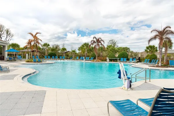 a view of a swimming pool with a lake view