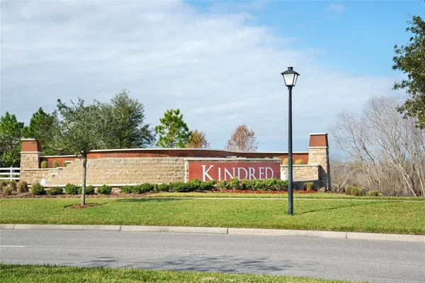 a view of a park with welcome board