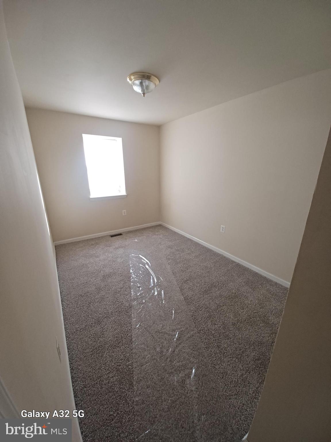 8213 Coatsbridge Court Severn, MD 21144 - Photo 14 of 19 an empty room with windows