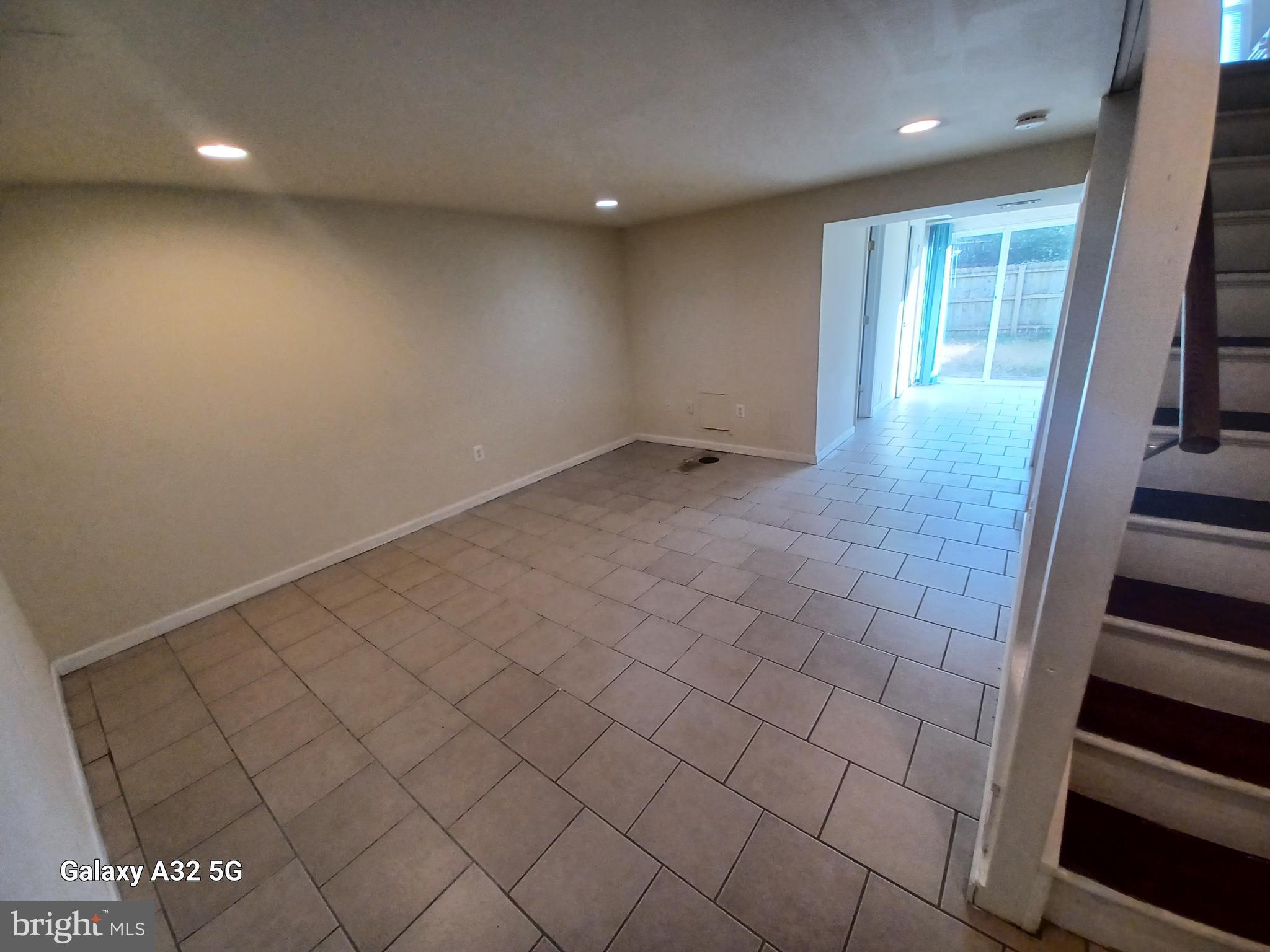 8213 Coatsbridge Court Severn, MD 21144 - Photo 15 of 19 an empty room with windows