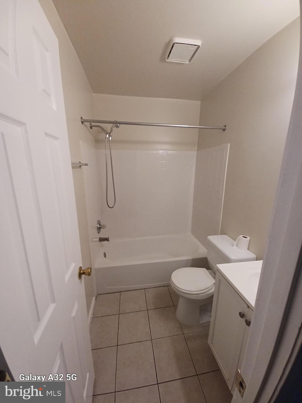 8213 Coatsbridge Court Severn, MD 21144 - Photo 18 of 19 a bathroom with a sink a toilet and shower