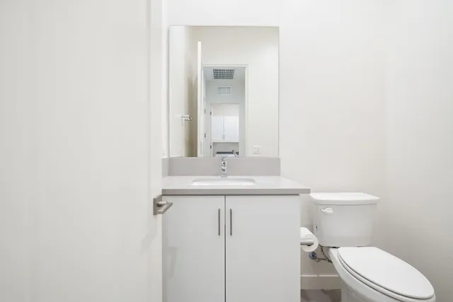 a room with gym equipment and a large window