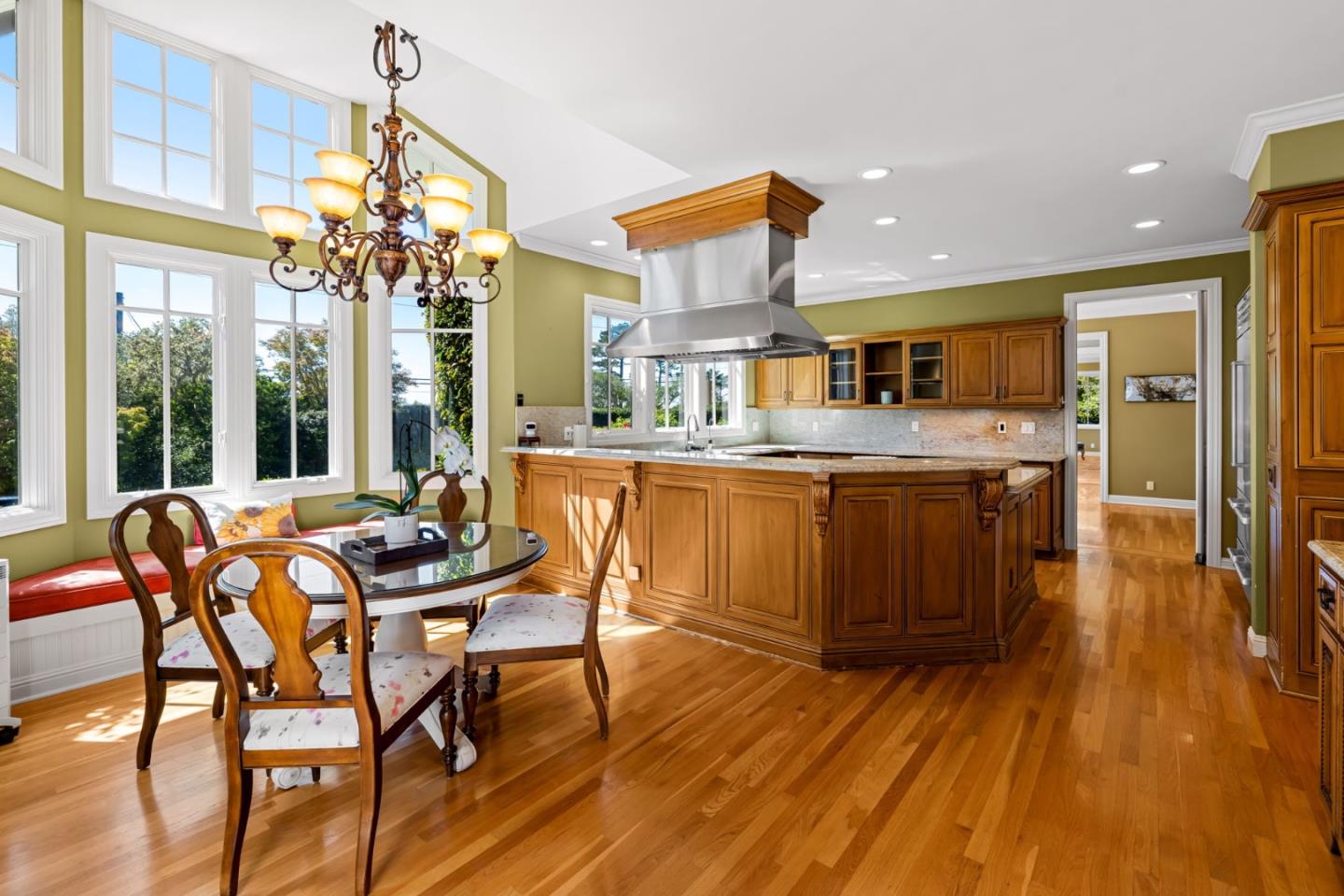 3937 Ronda Road Pebble Beach, CA 93953 - Photo 12 of 25 a view of a dining room with furniture window and wooden floor