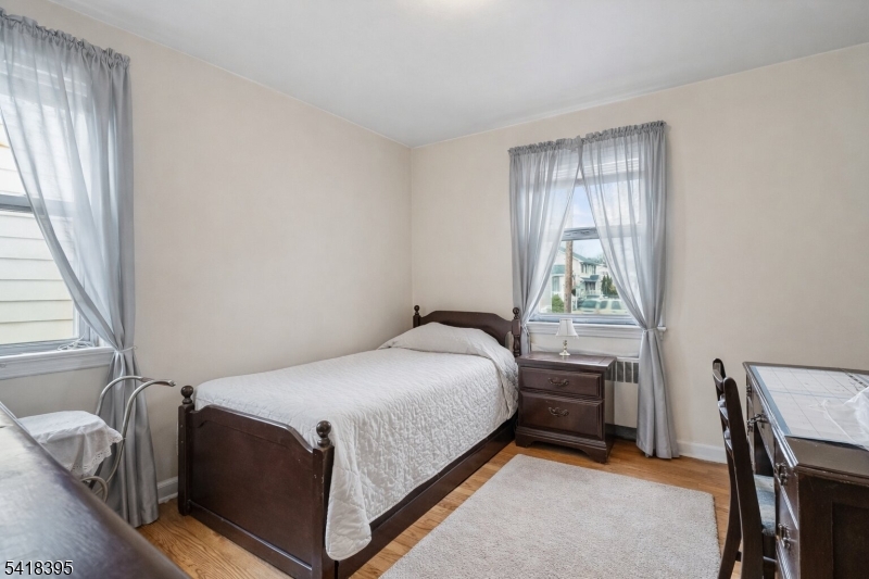 2970 Aberdeen Road Union, NJ 07083 - Photo 14 of 18 a bedroom with a bed and a window
