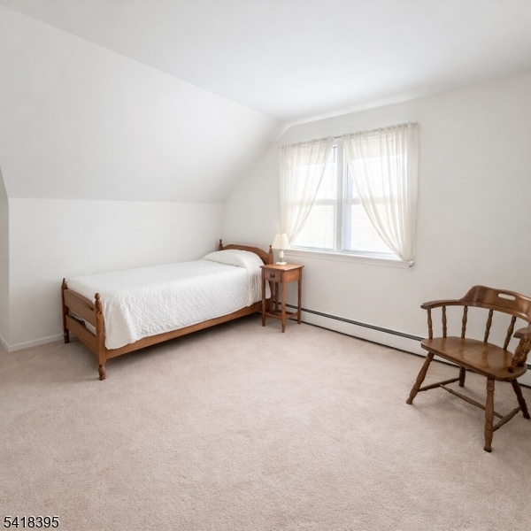 2970 Aberdeen Road Union, NJ 07083 - Photo 16 of 18 a room with a bed and a chair in it
