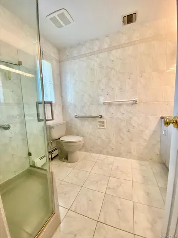 a bathroom with a sink and a shower