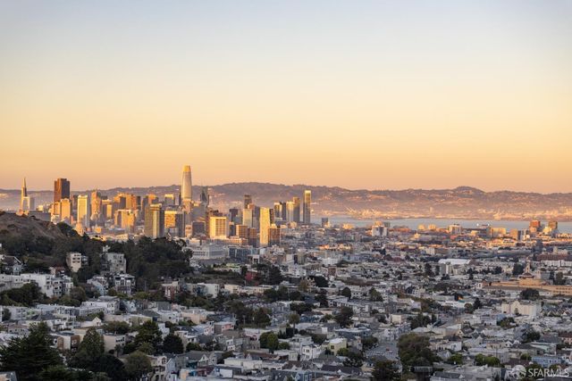 a view of a livingroom with furniture and window
