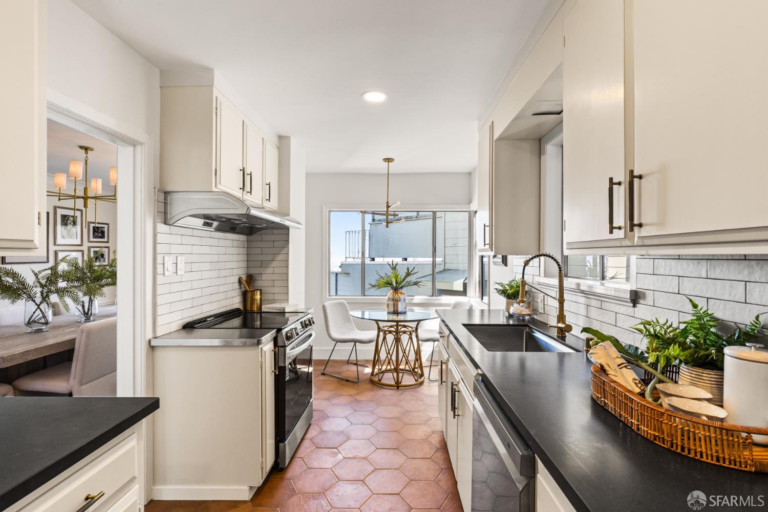 101 Graystone Terrace San Francisco, CA 94114 - Photo 30 of 72 a kitchen with counter top space appliances and cabinets