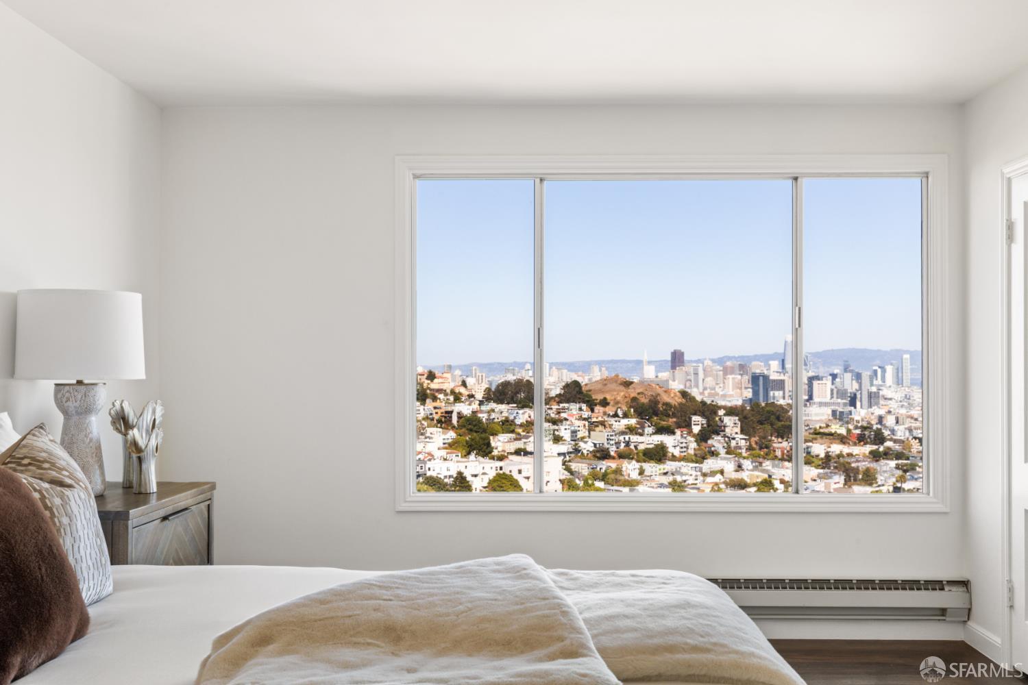 101 Graystone Terrace San Francisco, CA 94114 - Photo 43 of 72 a bedroom with a bed and a window