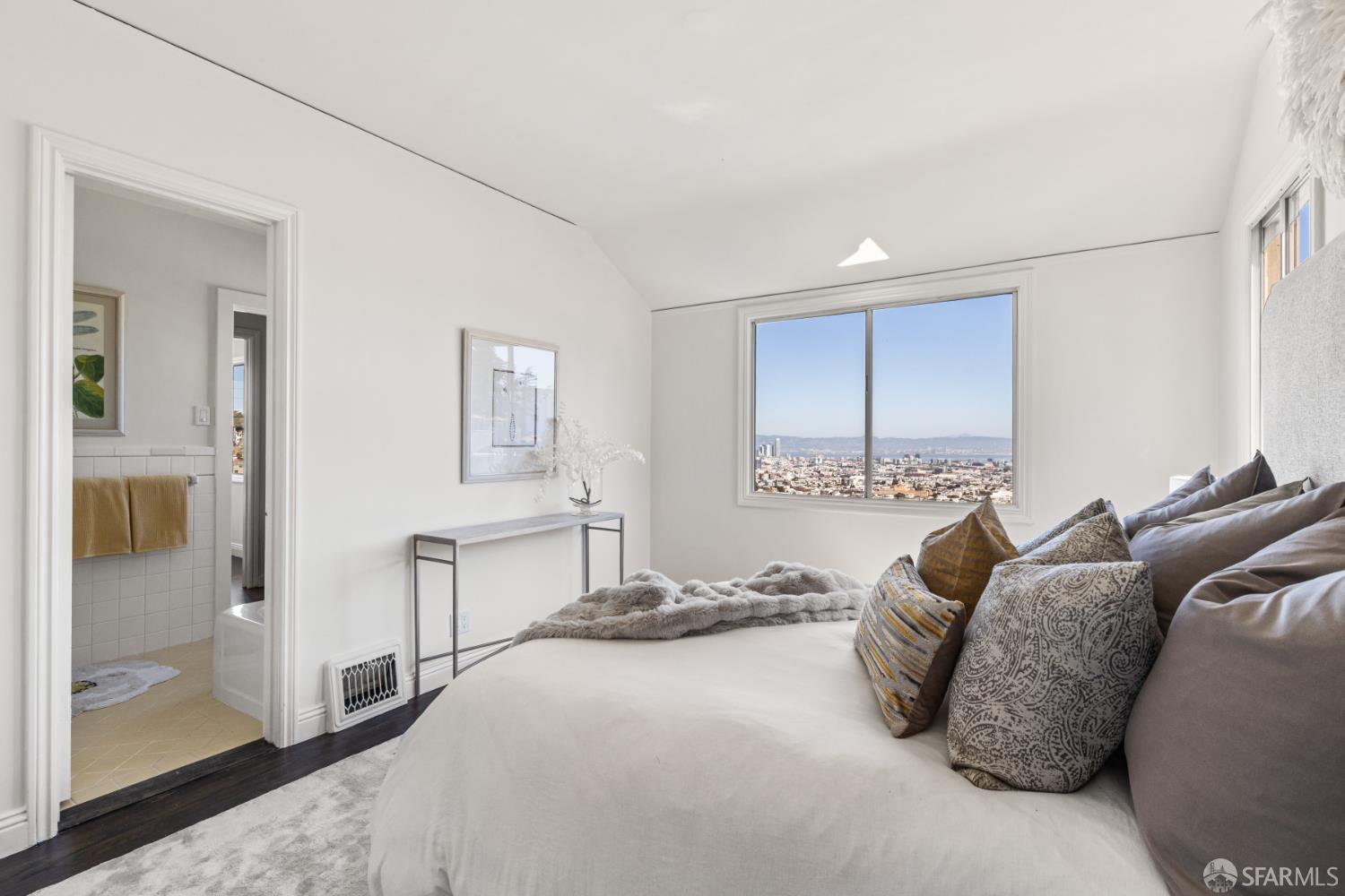 101 Graystone Terrace San Francisco, CA 94114 - Photo 49 of 72 a bedroom with a bed and a window