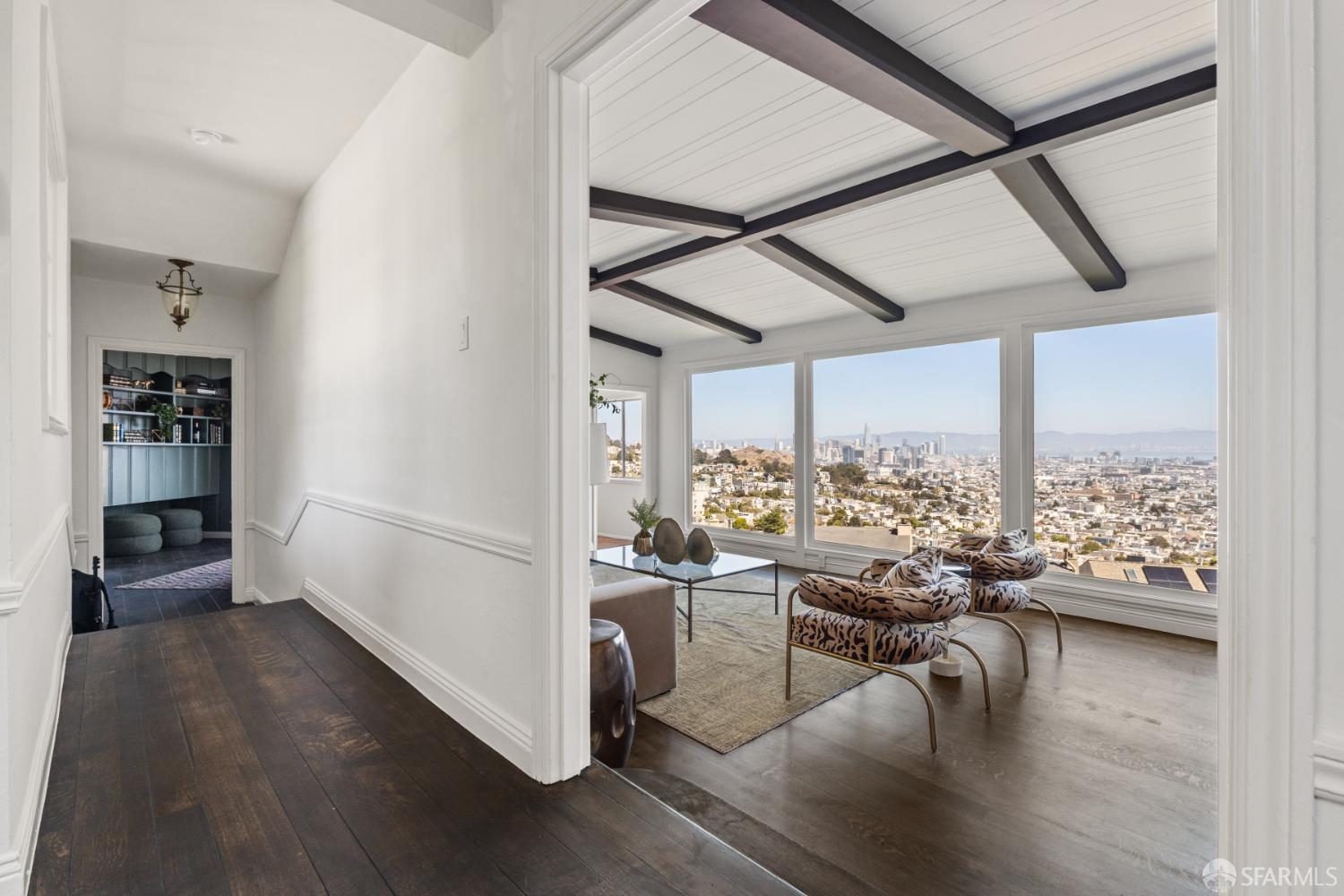 101 Graystone Terrace San Francisco, CA 94114 - Photo 5 of 72 a very nice looking room with wooden floor and furniture