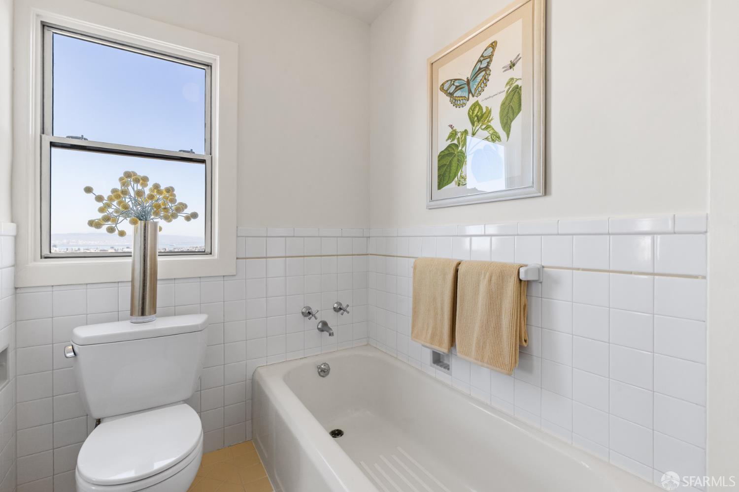 101 Graystone Terrace San Francisco, CA 94114 - Photo 51 of 72 a white toilet sitting next to a bath tub