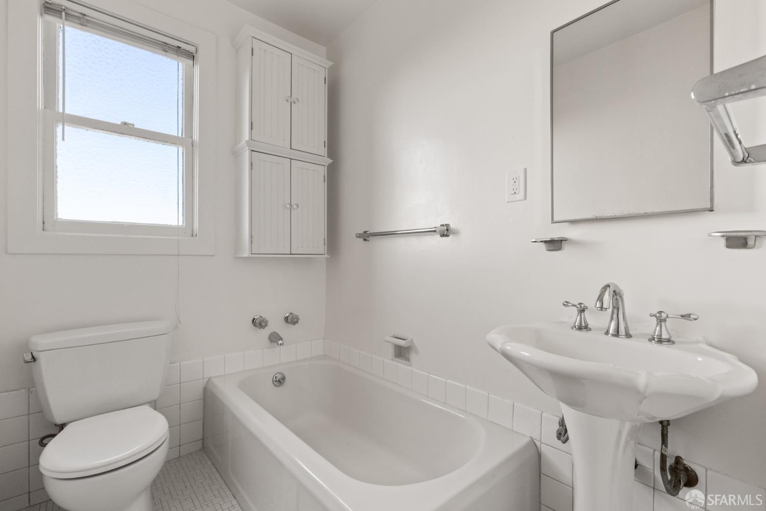 101 Graystone Terrace San Francisco, CA 94114 - Photo 61 of 72 a bathroom with a sink a toilet and bathtub