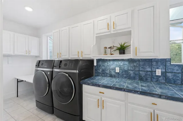 a room with furniture and gym equipment