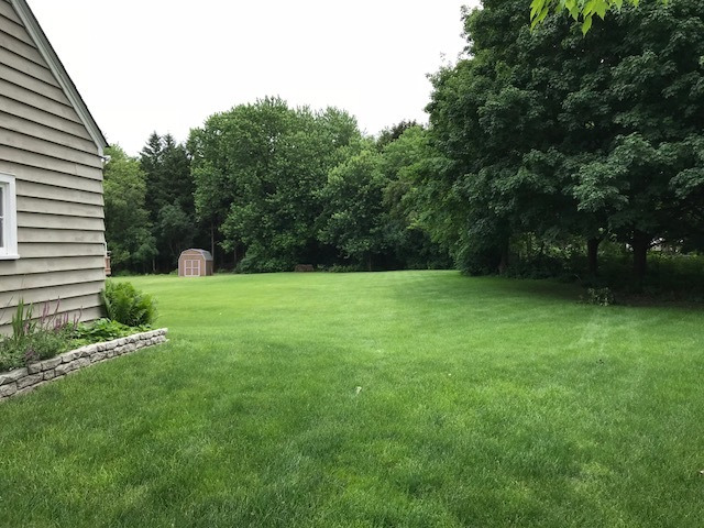 1875 Church Road Aurora, IL 60505 - Photo 23 of 26 a view of a garden with a house