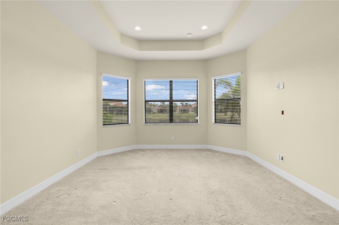 11643 Meadowrun Circle Fort Myers, FL 33913 - Photo 12 of 39 an empty room with windows
