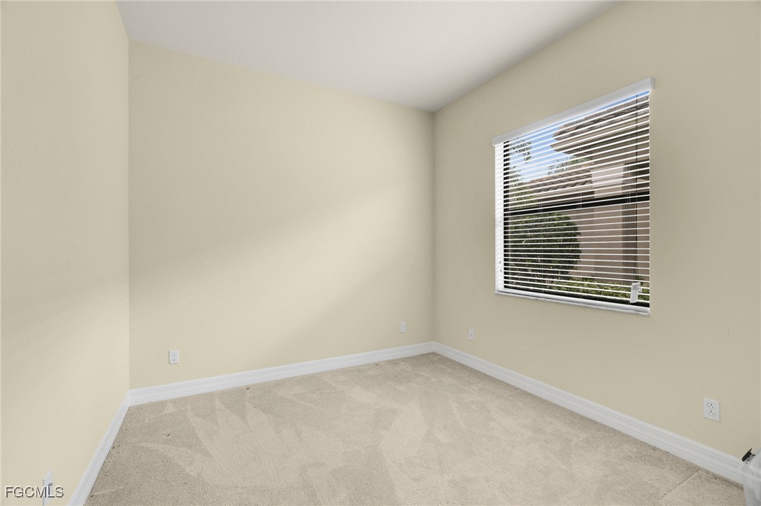11643 Meadowrun Circle Fort Myers, FL 33913 - Photo 18 of 39 an empty room with a window